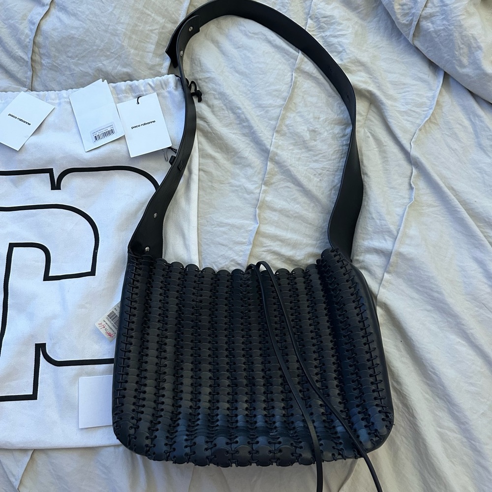 Paco Rabanne coin bag. Black leather.